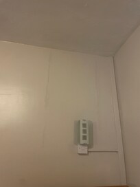 Damp, can see lines of wallpaper where damp has settled