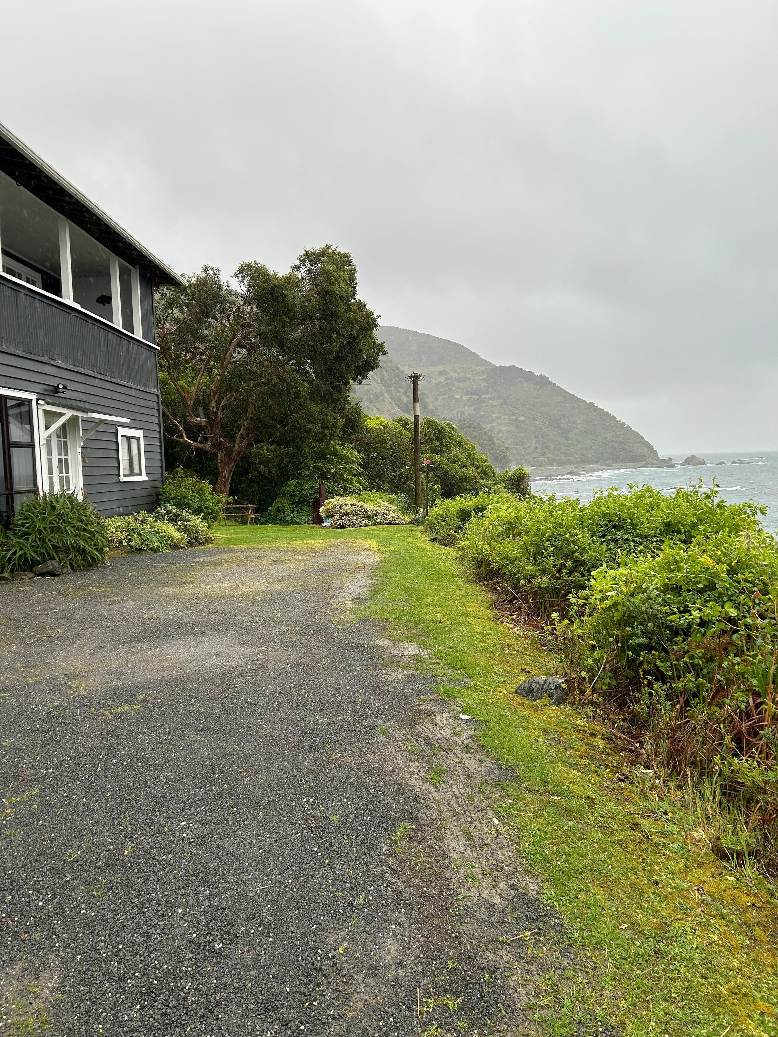 Front of bach, looking out over the sea.