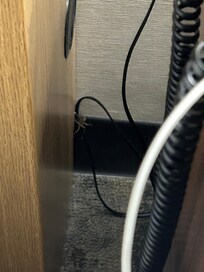 Hugs spider near the bed and night stand