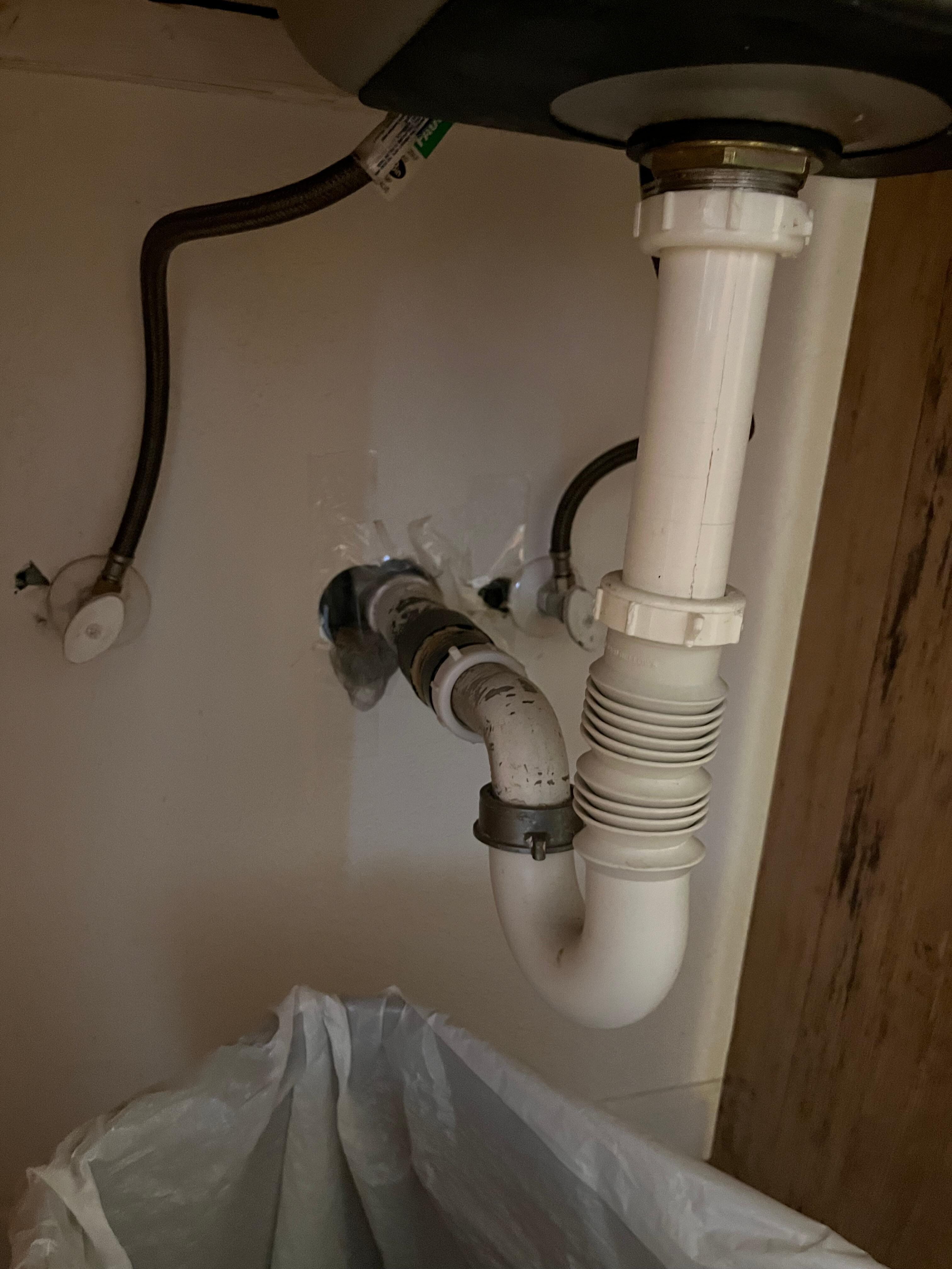 Tape covering up holes in the wall