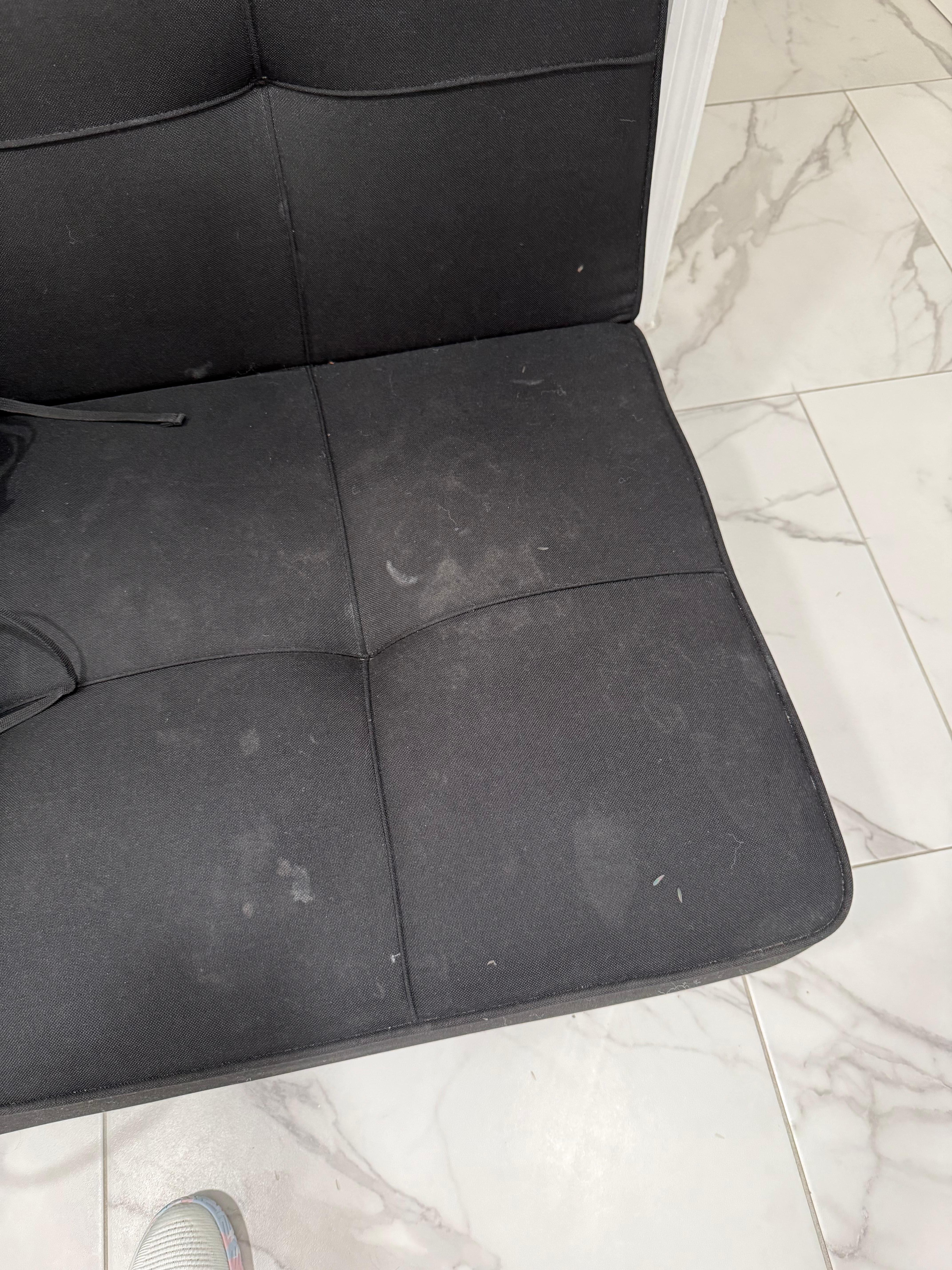 Stained sofa bed
