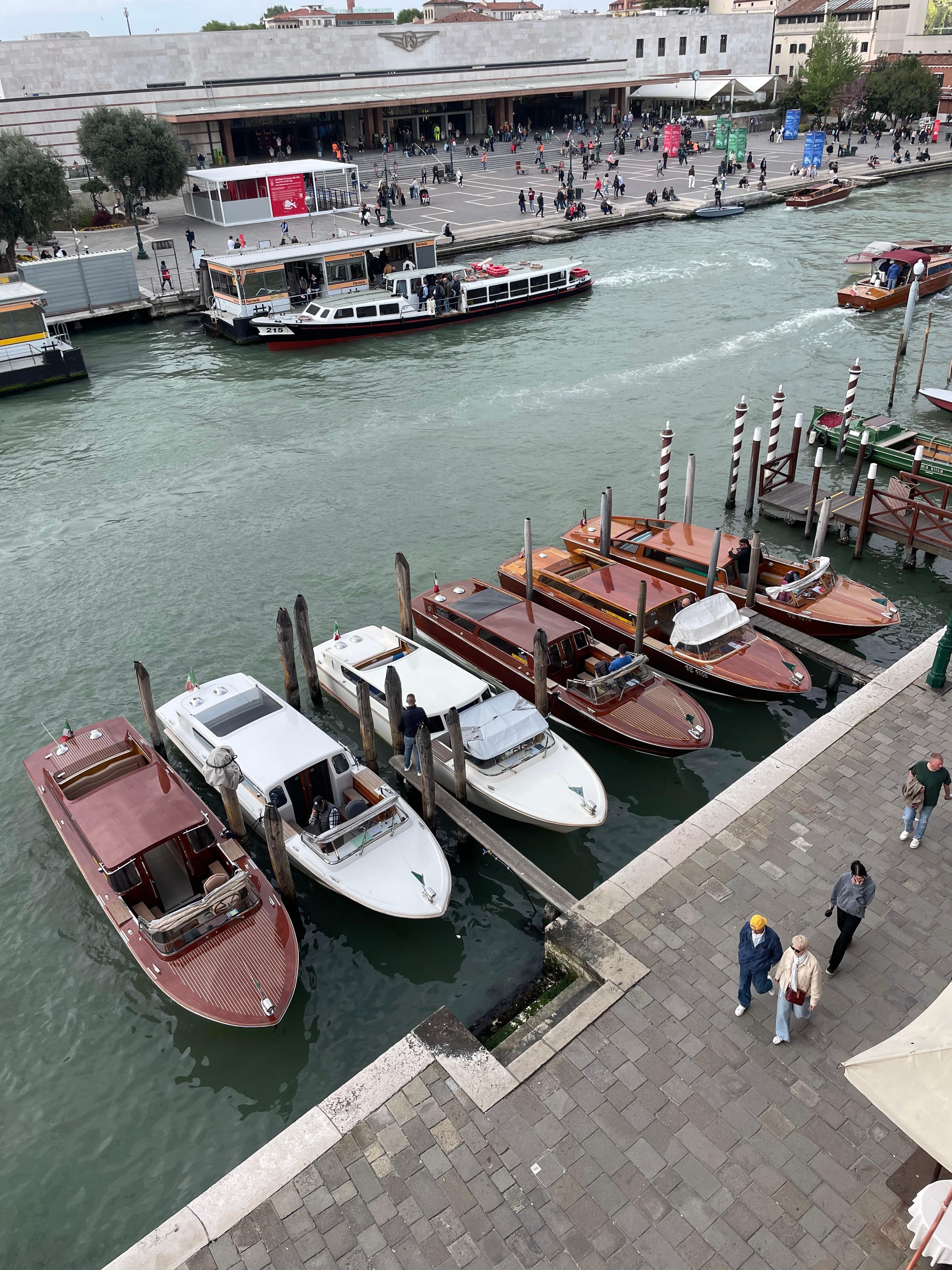 View from living room of grand canal and train station in background. 