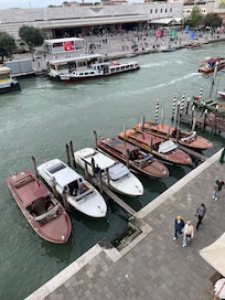 View from living room of grand canal and train station in background.