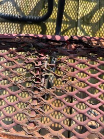 Outdoor picnic table (looks burnt).