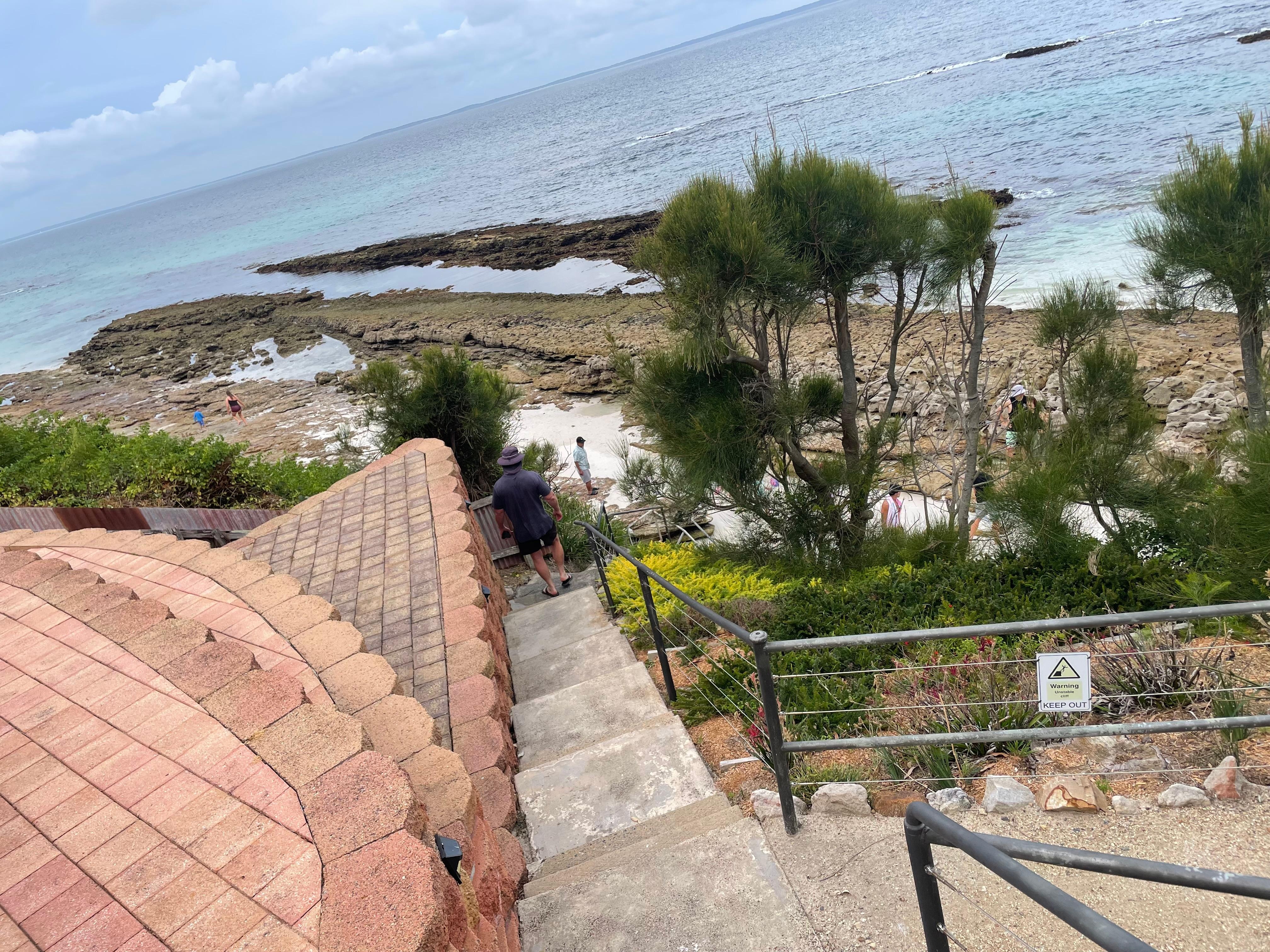 Walk down the steps and you’re right on the beach.