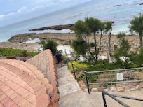 Walk down the steps and you’re right on the beach.