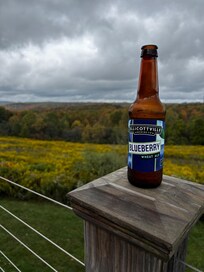 You could live just on that porch in the cozy Adirondack chairs with a blanket and a beer