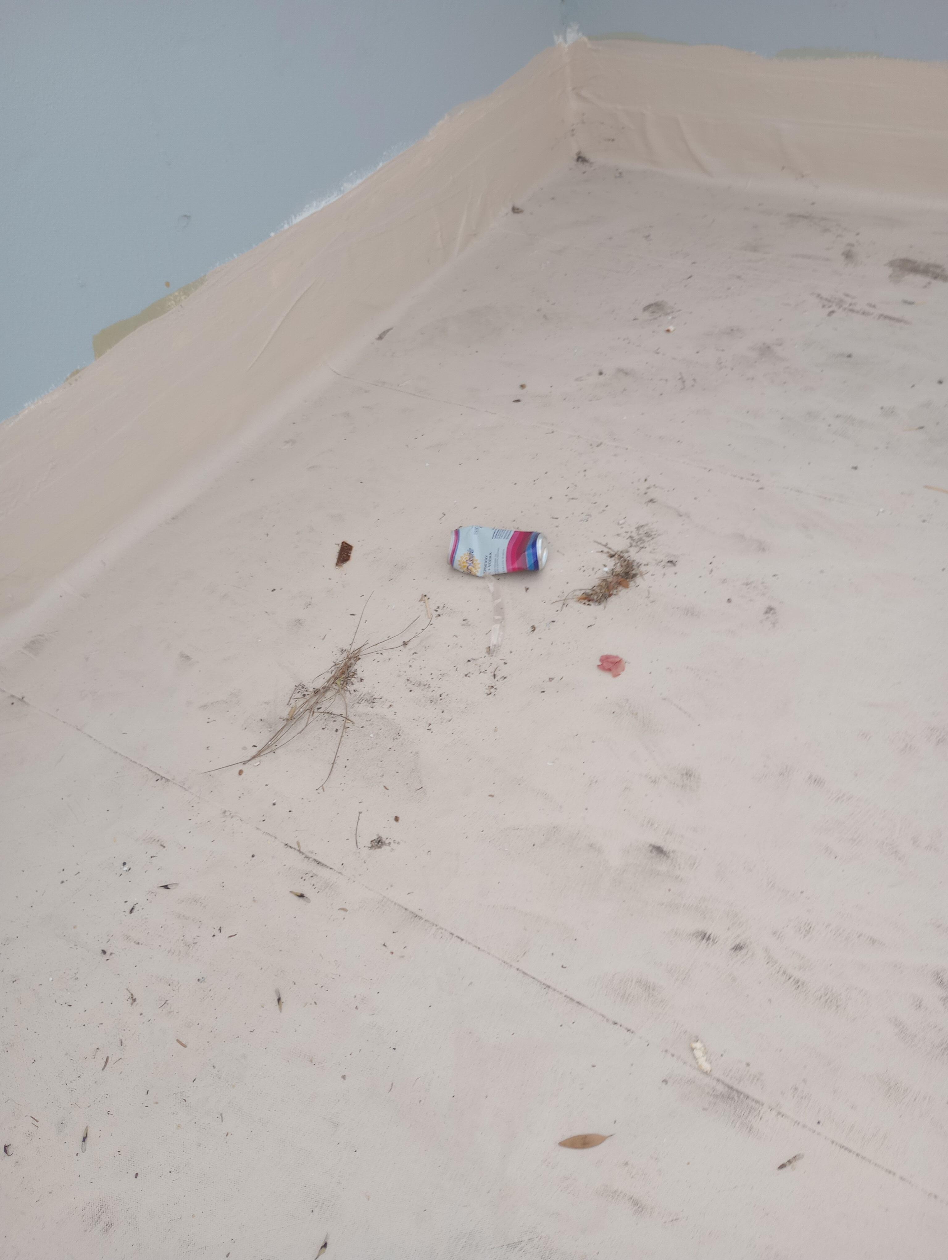 Walking into the rooftop we found trash left on the ground (empty can, etc.)
