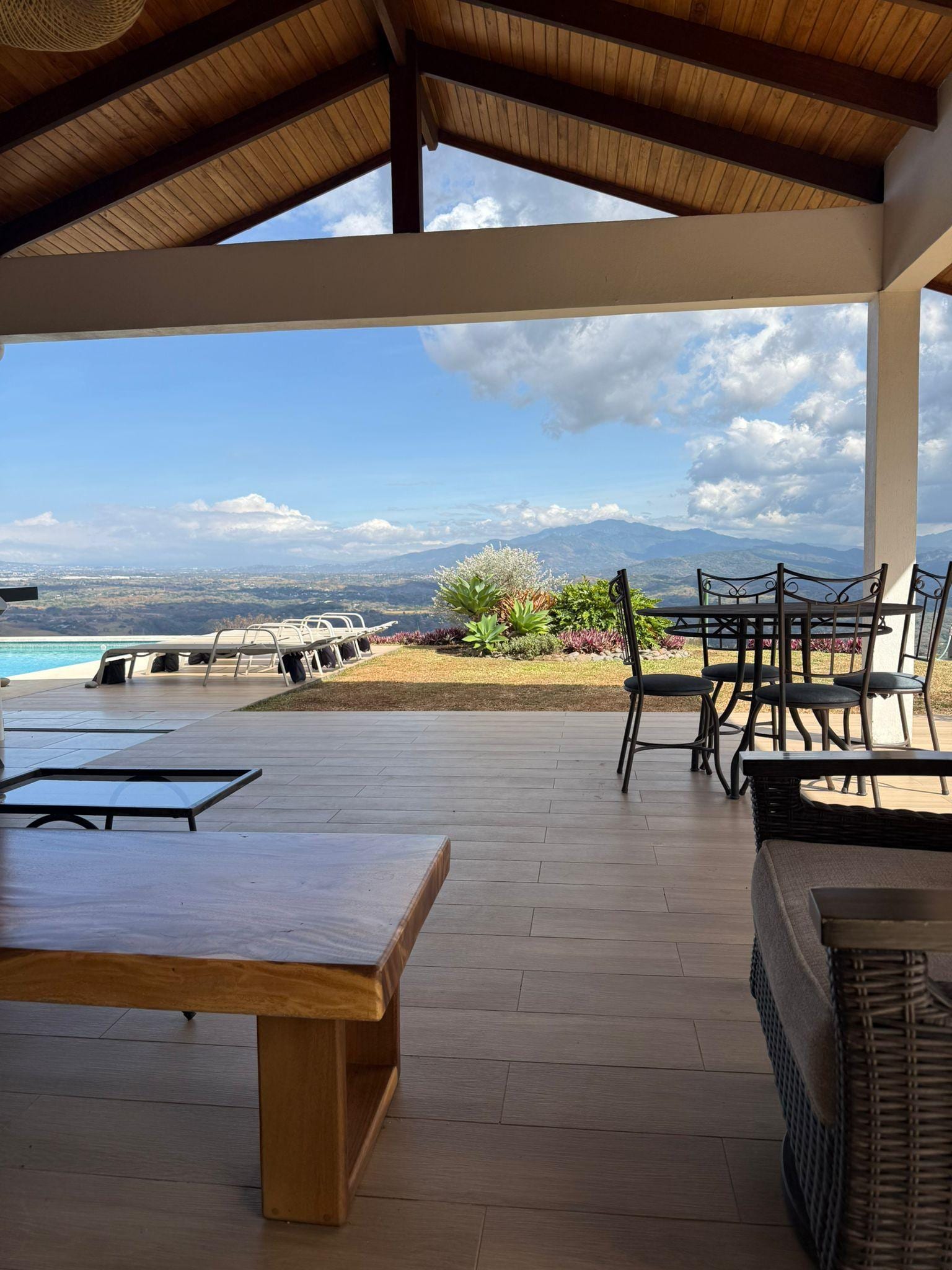 Covered area with a beautiful view wonderful for morning coffee, reading and evening cocktails.