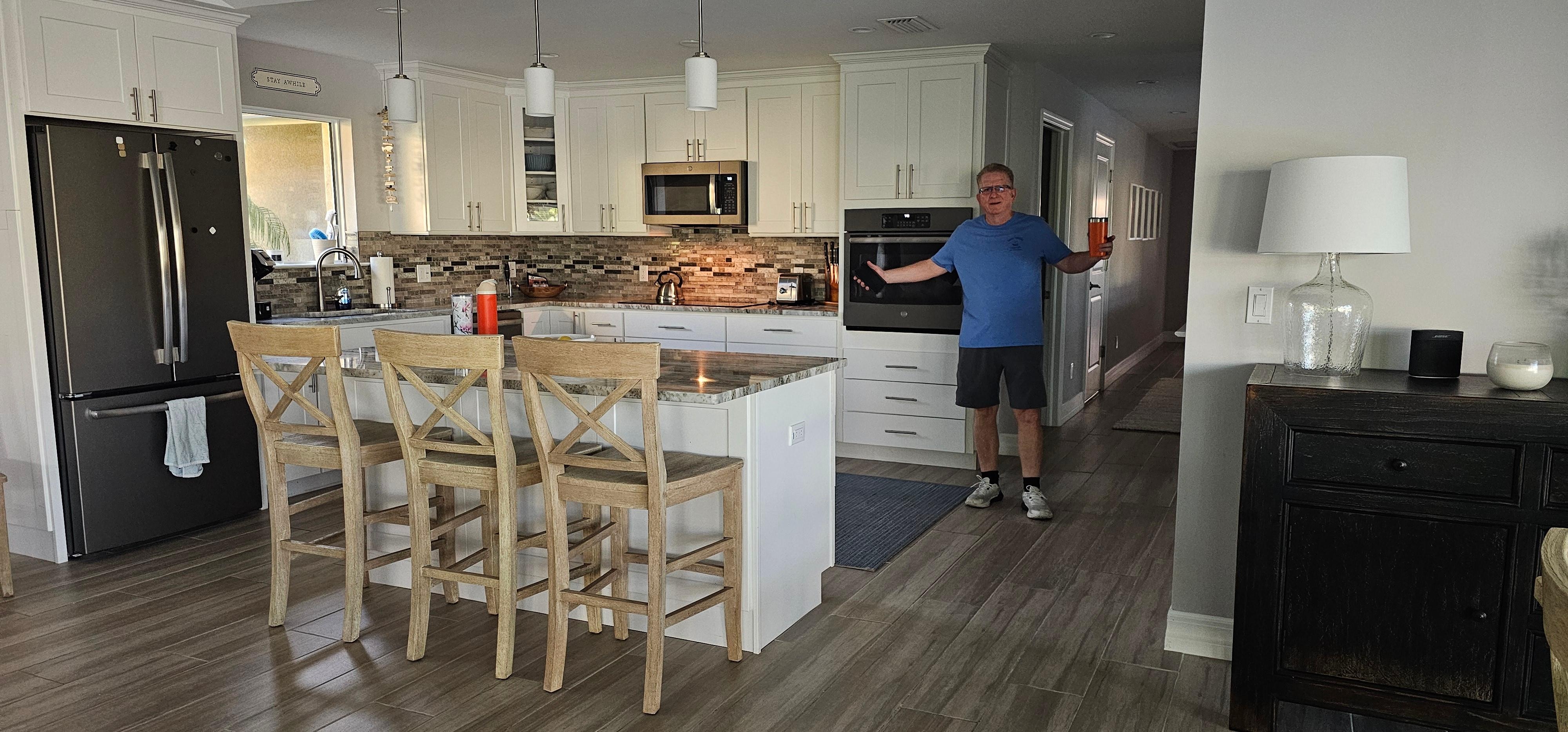 My husband never worked in that kitchen he is pointing to!