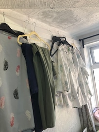 Had to hang clothes on the picture rail