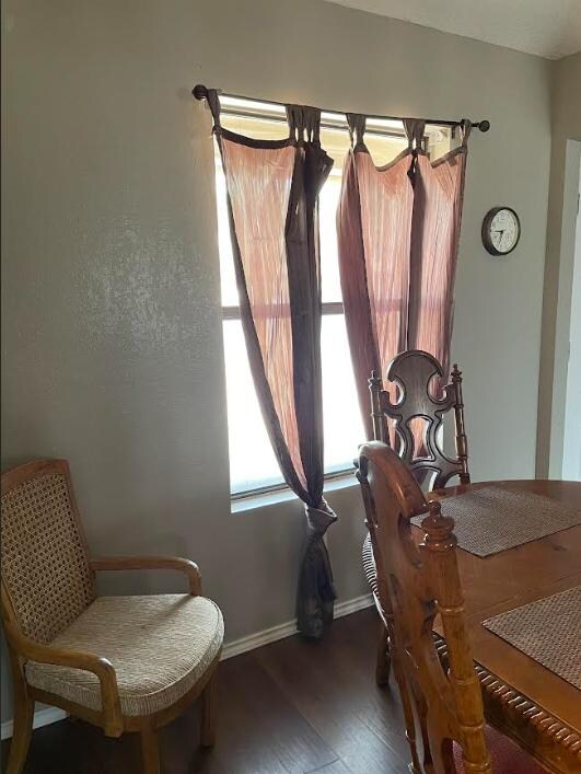 The curtain rod that was bent and barely attached to the wall, the window facing the rd. has no blind and you can see straight into the house. We were afraid to untie the curtain, for fear it would all come falling down.
