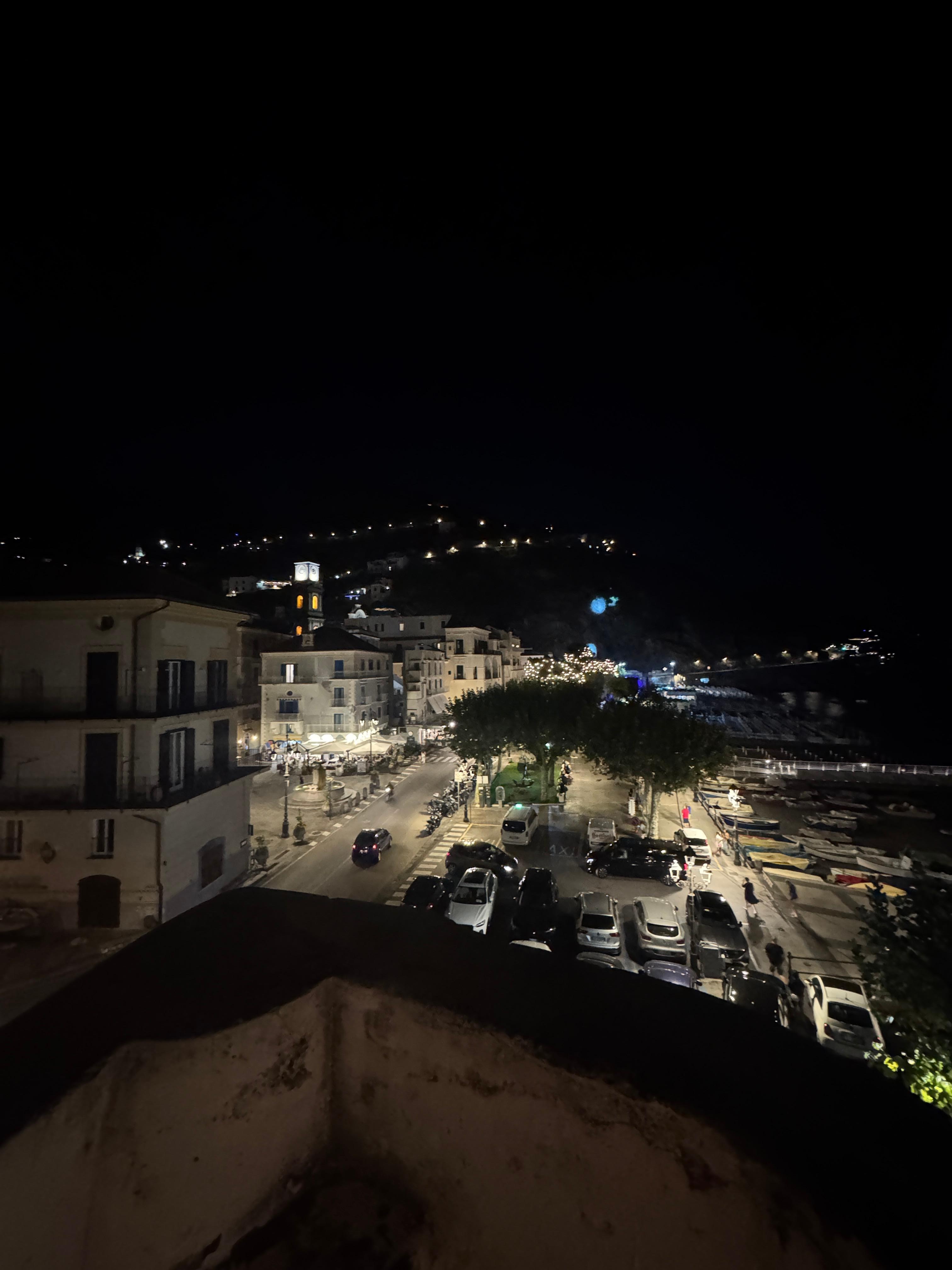 View from balcony of room at night. 