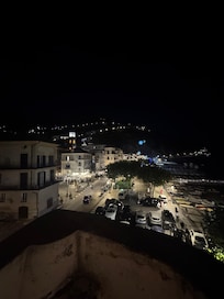 View from balcony of room at night.