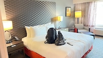 The bed and view of the living space.