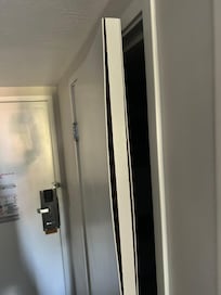 The bathroom door was coming apart.