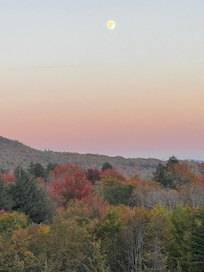 View of the moon coming out from one of the balconies during color chanfe