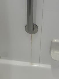 Rust dripping near bath tub