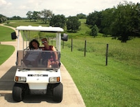 Used gold cart on property.