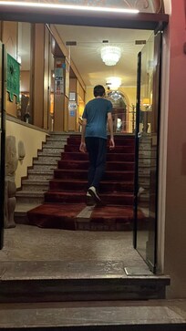 I travelled with my son, who left the hotel where he was staying with friends from the orchestra to stay at my room.