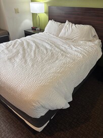 Initial room unmade bed