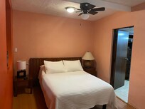 chambre, ouverte sur la cuisine