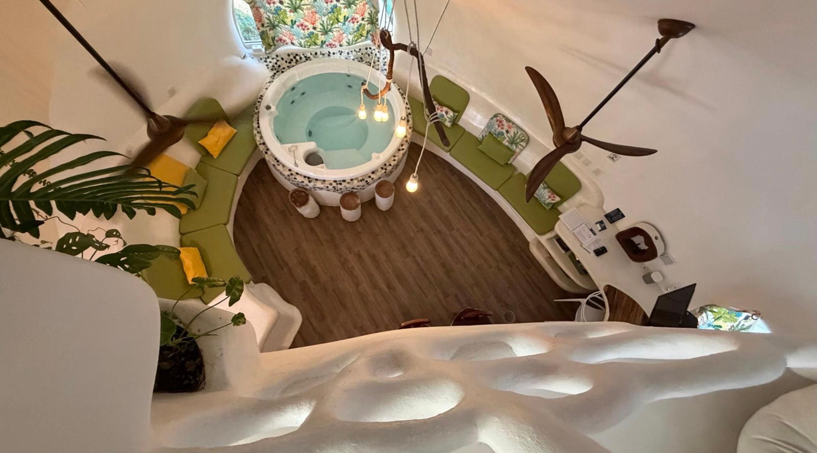 Looking down into the living room from the bedroom loft