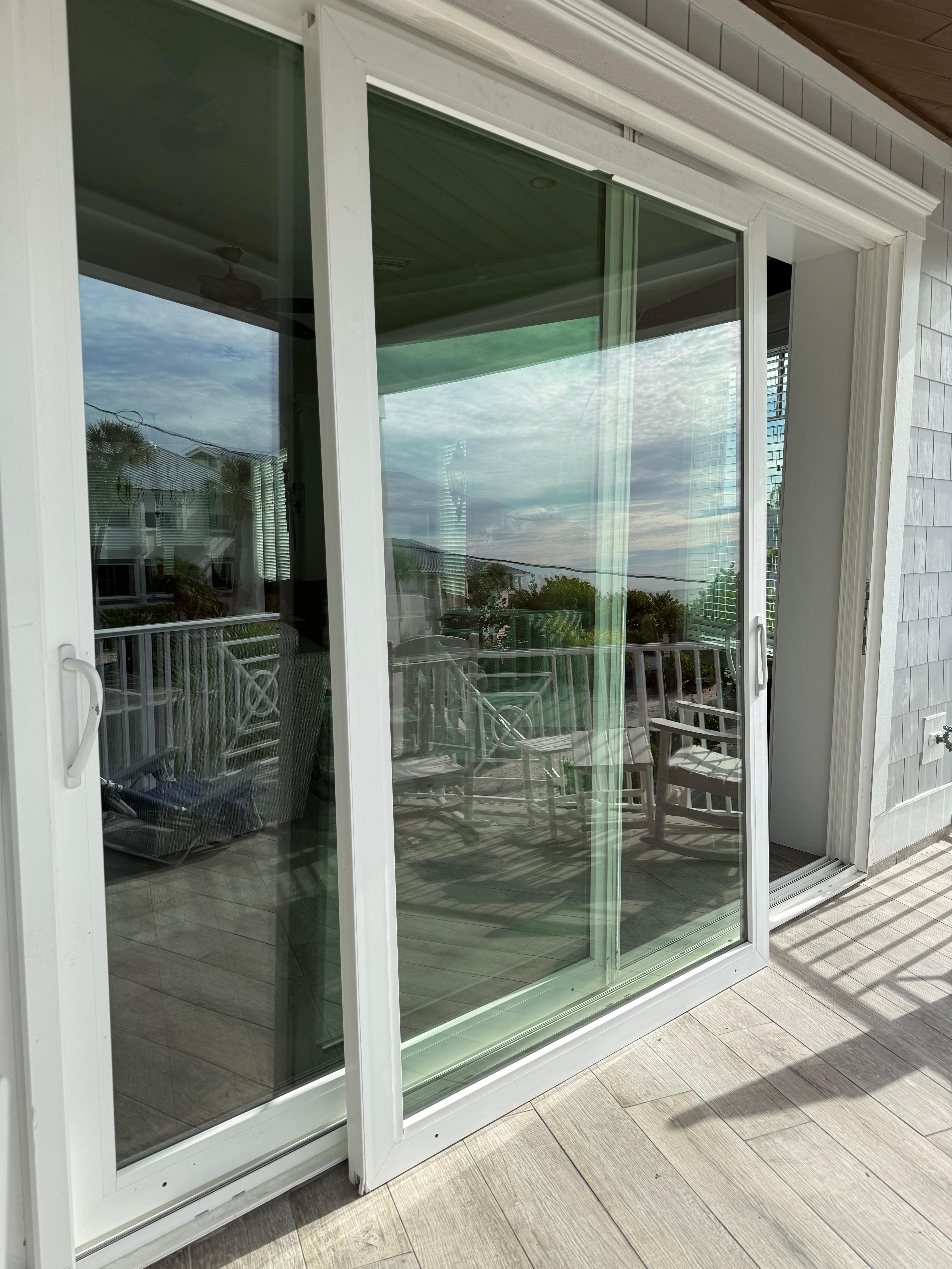 The glass sliding door that came down!  We picked them up before picture because it fell on someone! 