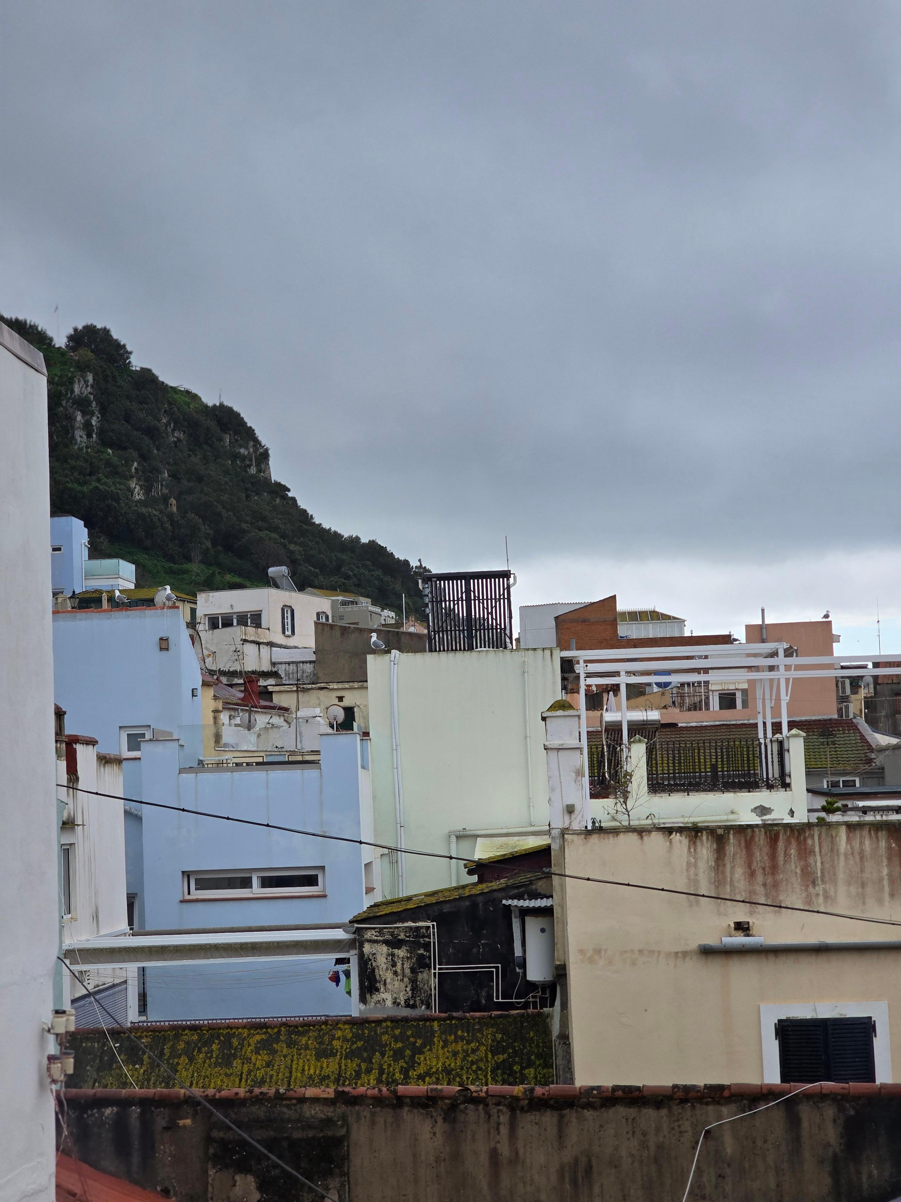 The Rock is visible to the left of the balcony 