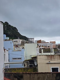 The Rock is visible to the left of the balcony