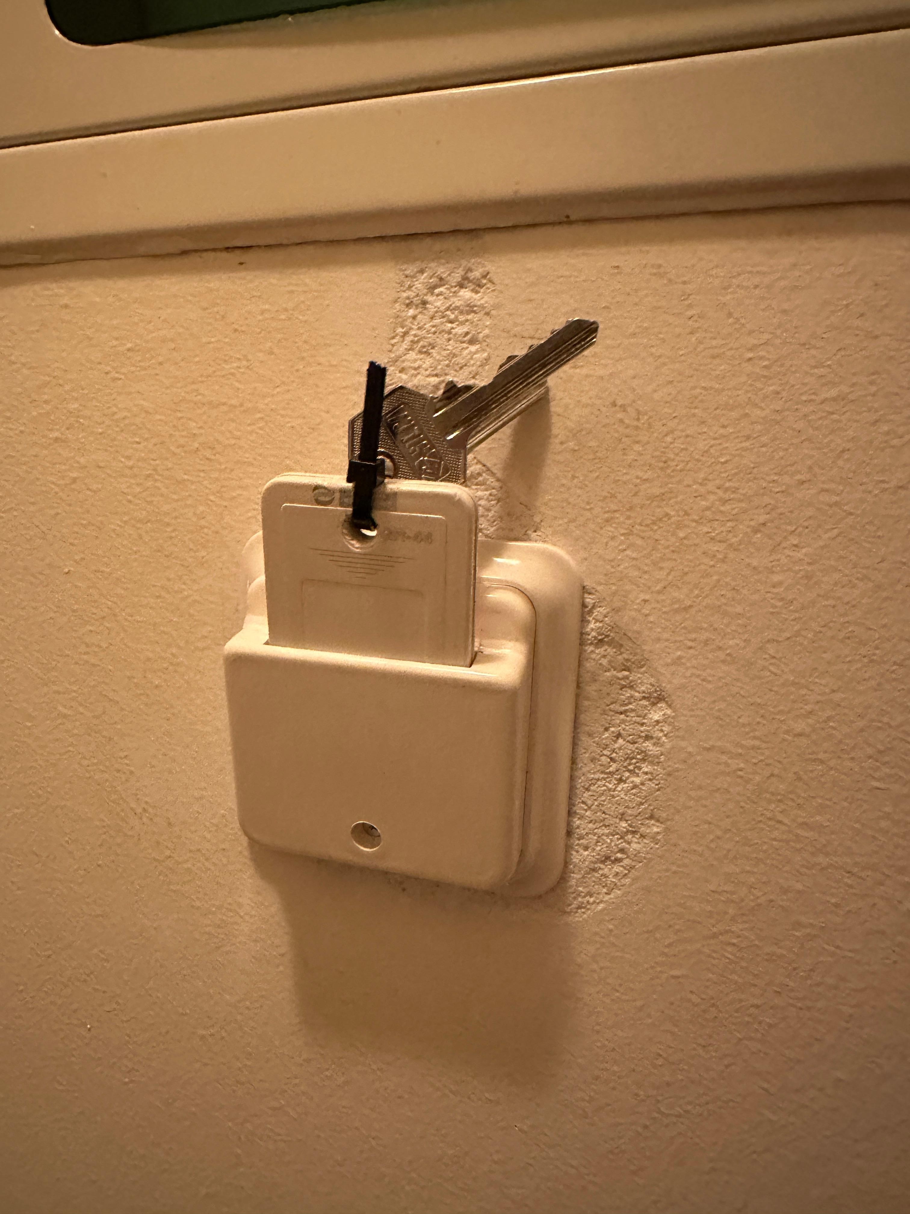 Key that had to remain inserted for power. If someone wanted to go out, it left others without power. Or someone had to remain to let others back in. Very inconvenient.