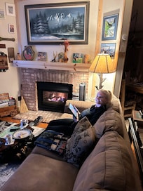 Enjoying a cozy fire! Relaxing in the living room after a fabulous home cooked meal.