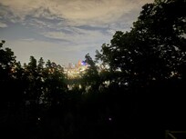 View of skyline at night.