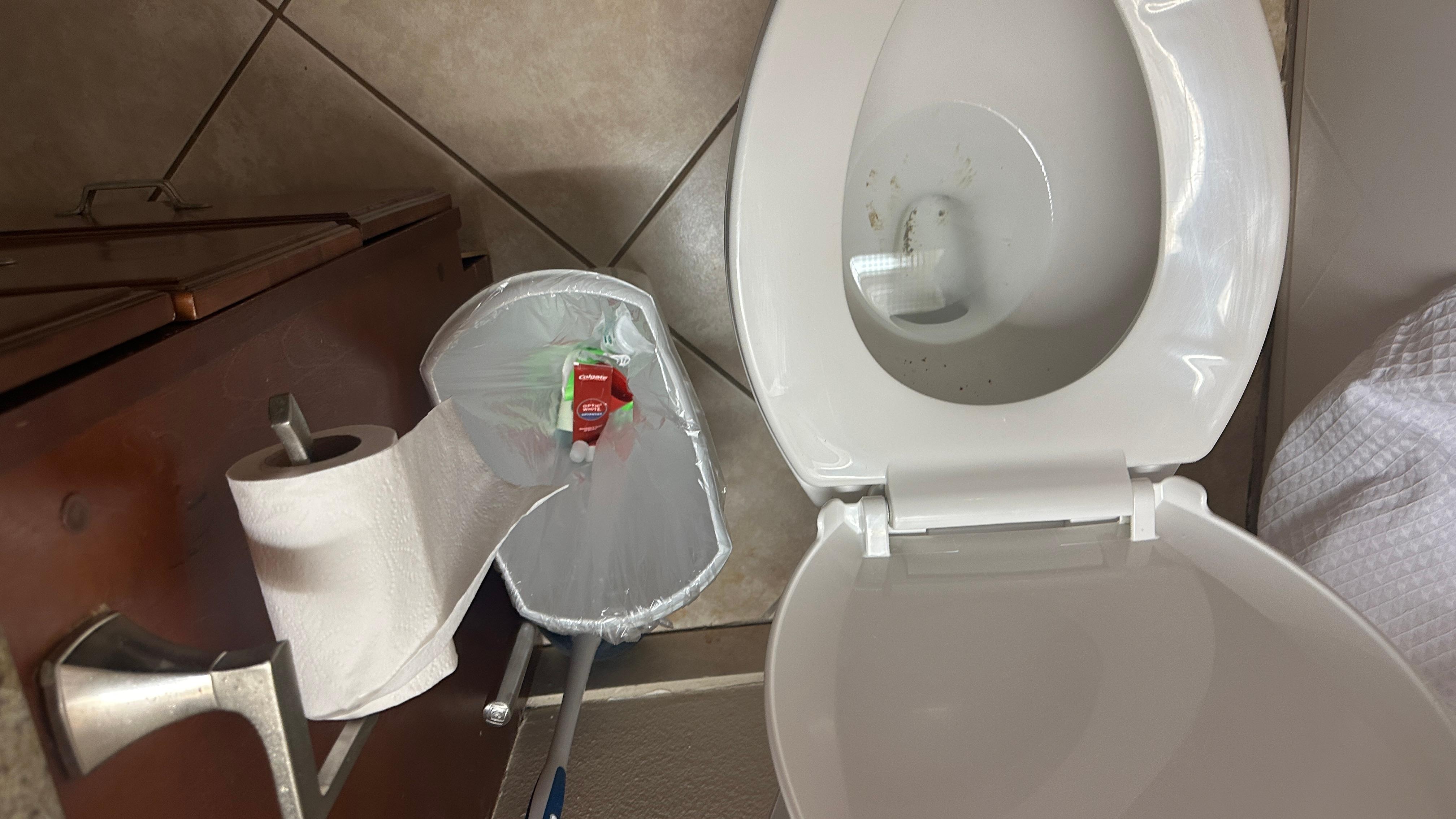 Trash cans with trash at check in. 