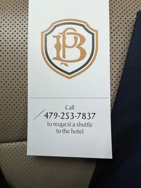 Shuttle service and parking pass.