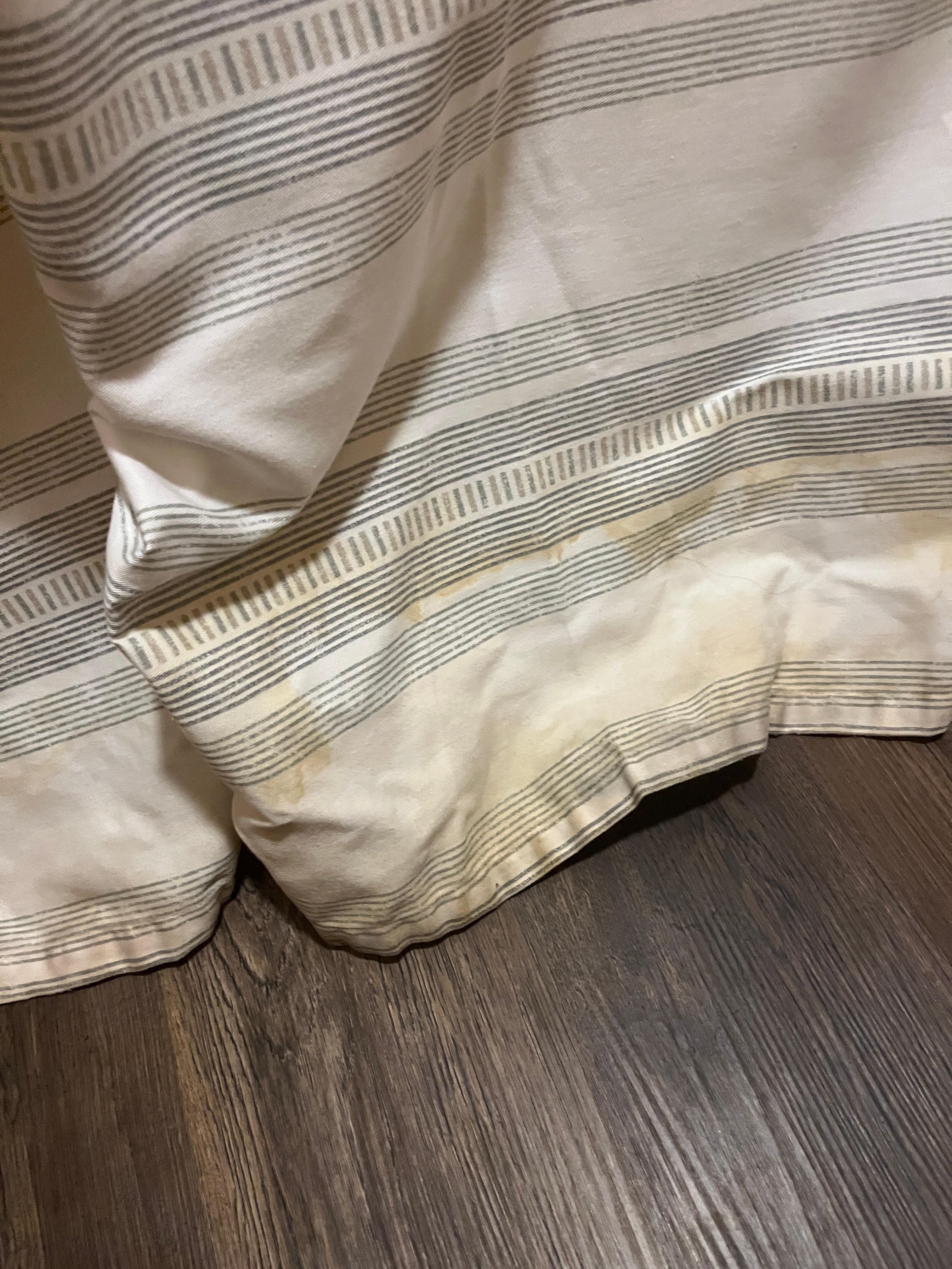 Stained shower curtain 