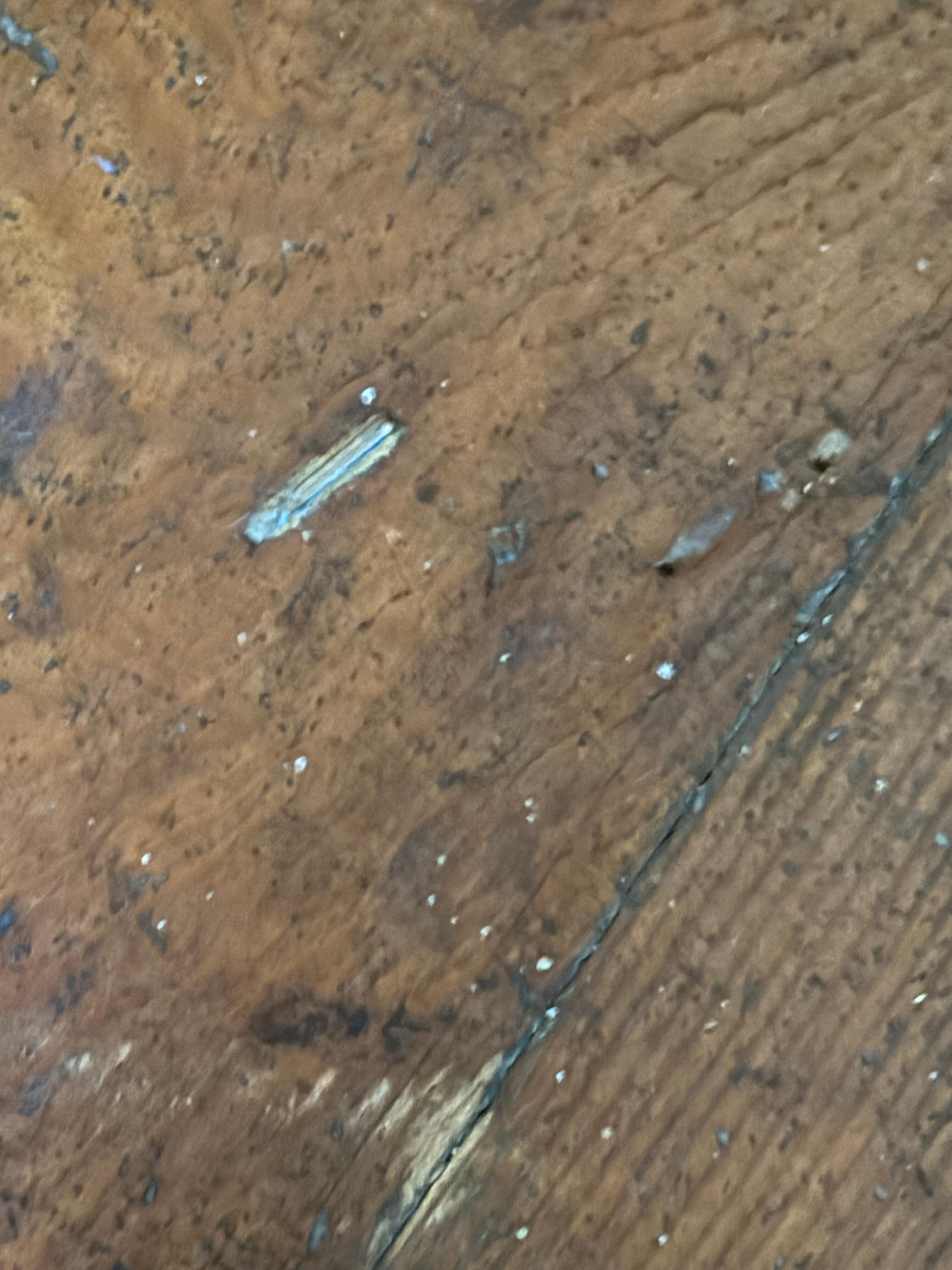 Staples in flooring where the carpet never be was. 