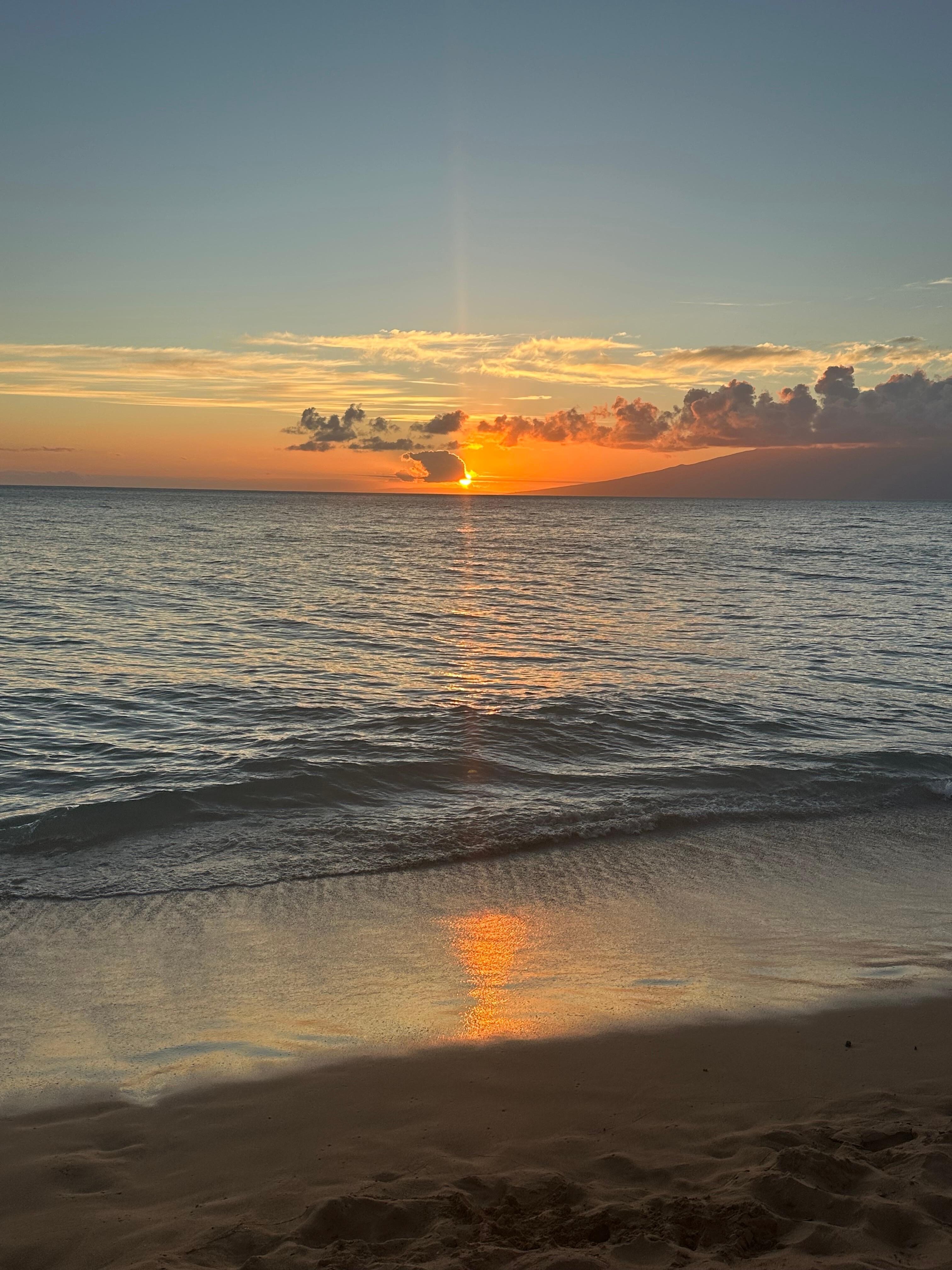 Sunset on beach outside of Dukeās