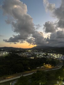 View at dusk over front balcony.