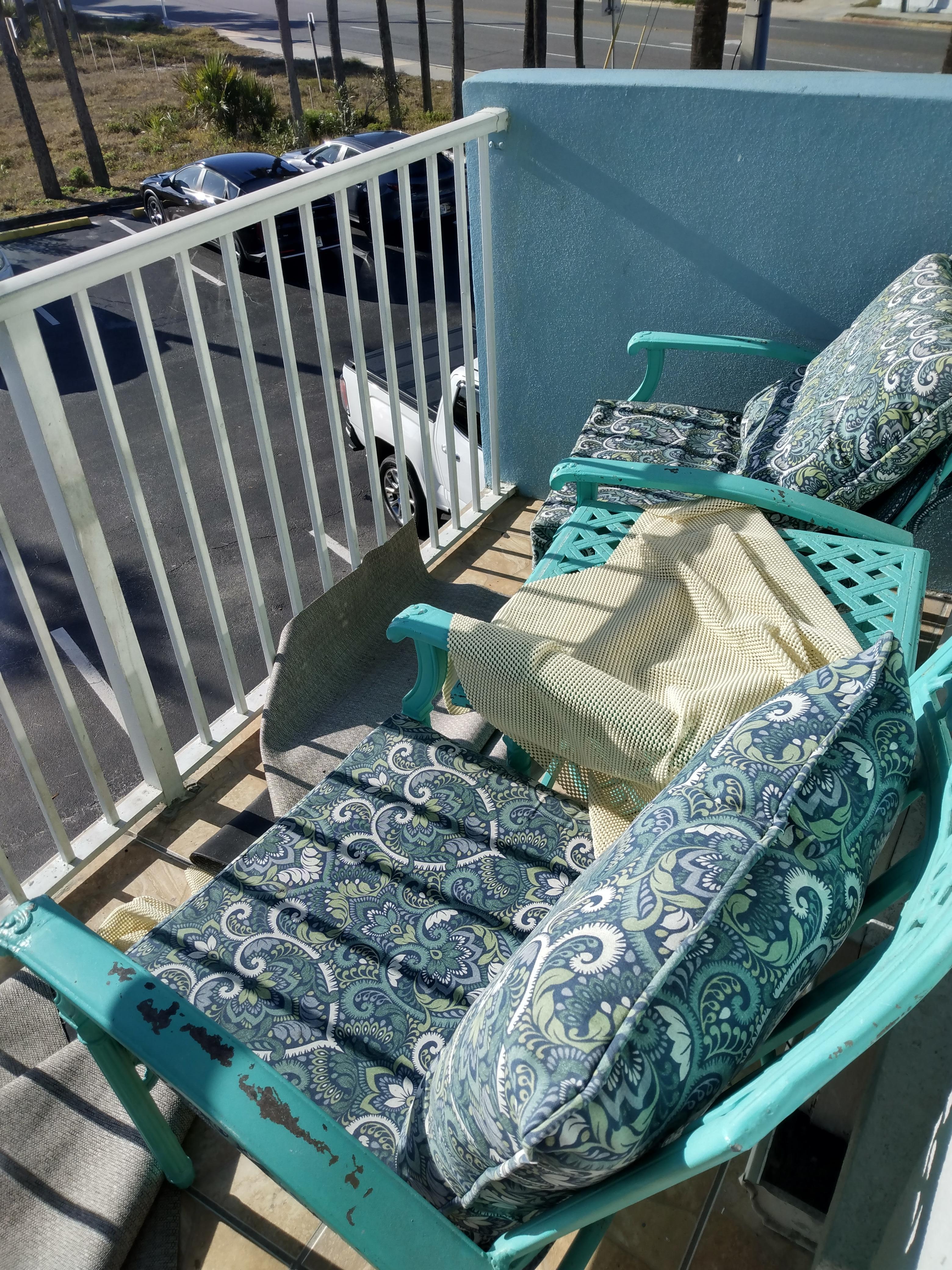 Lanai with torn up carpet