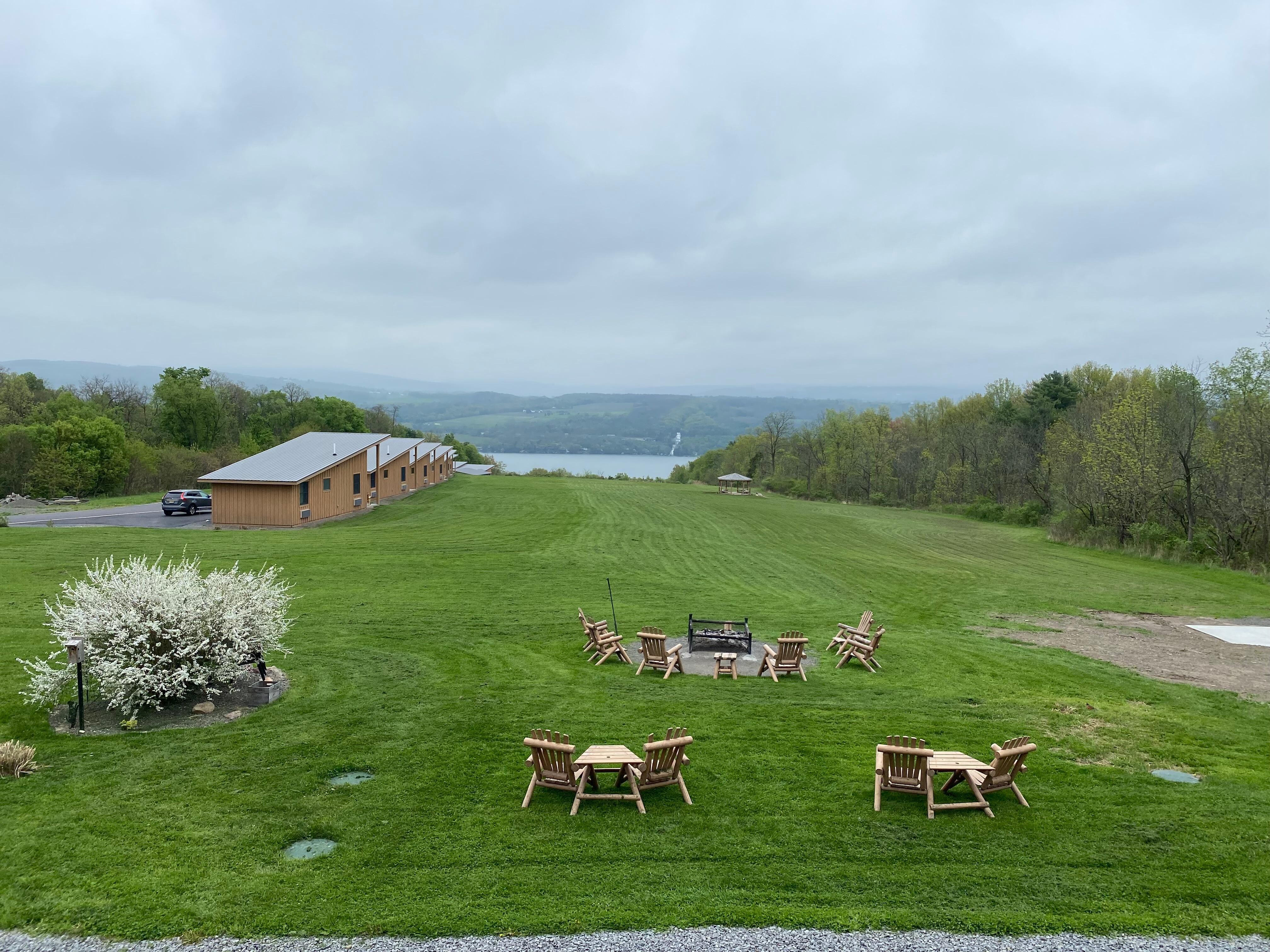 Peaceful green space with Seneca Lake in the distance, taken from our balcony.