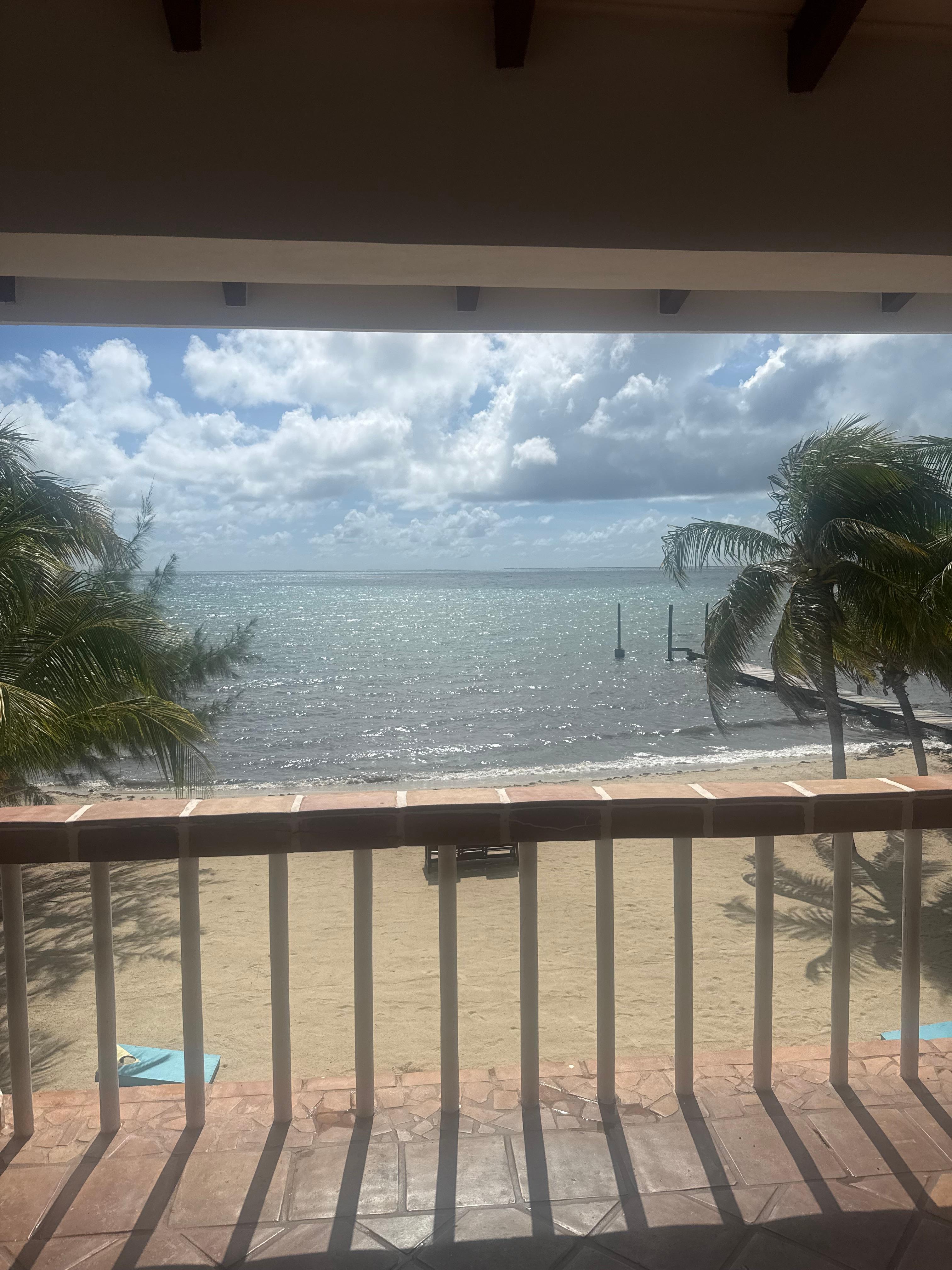 In the morning, drinking coffee from the balcony of the house.