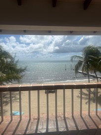 In the morning, drinking coffee from the balcony of the house.