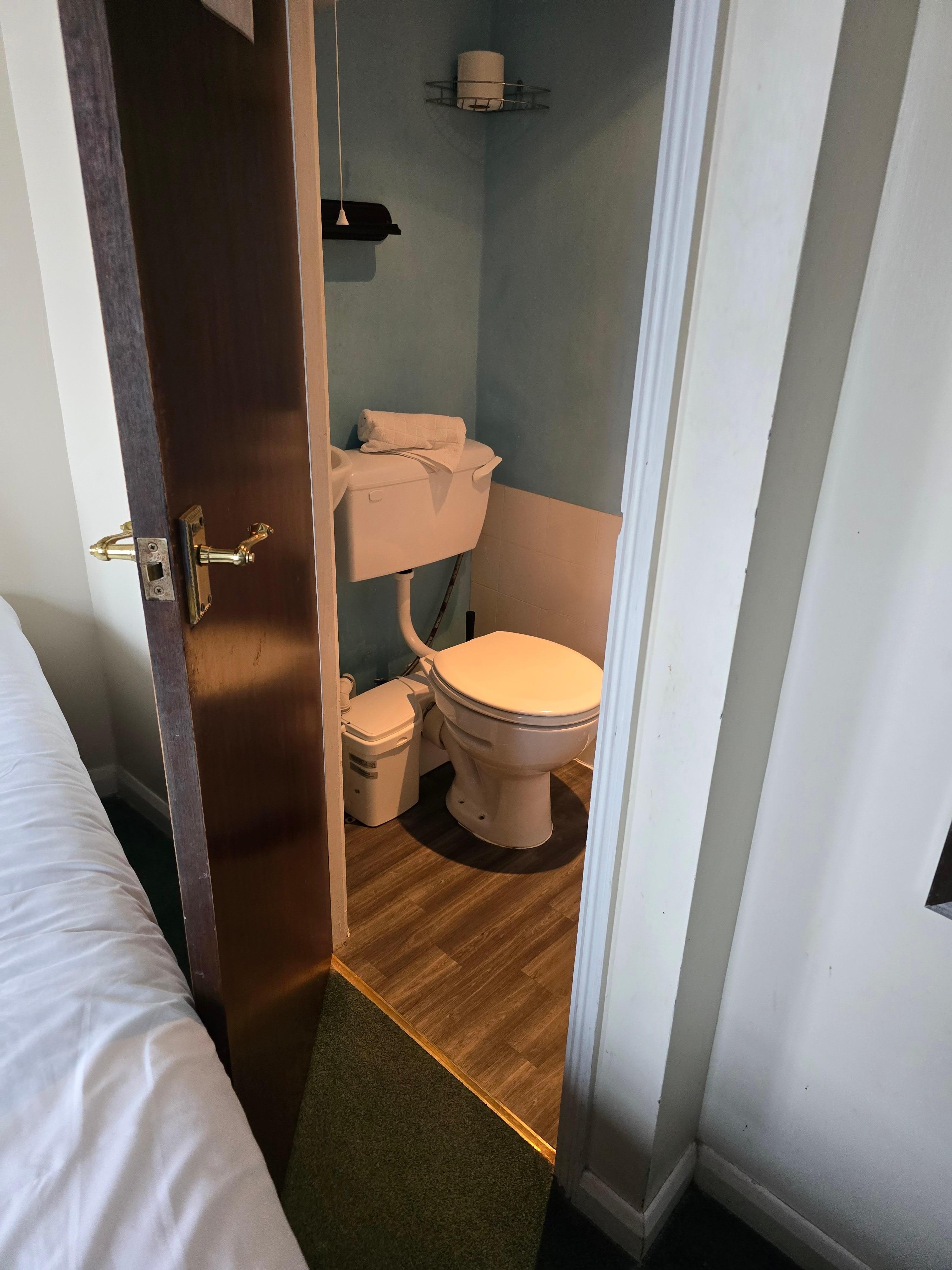 This is as wide as the restroom door could open