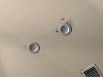 Water damage where Sheetrock falling in