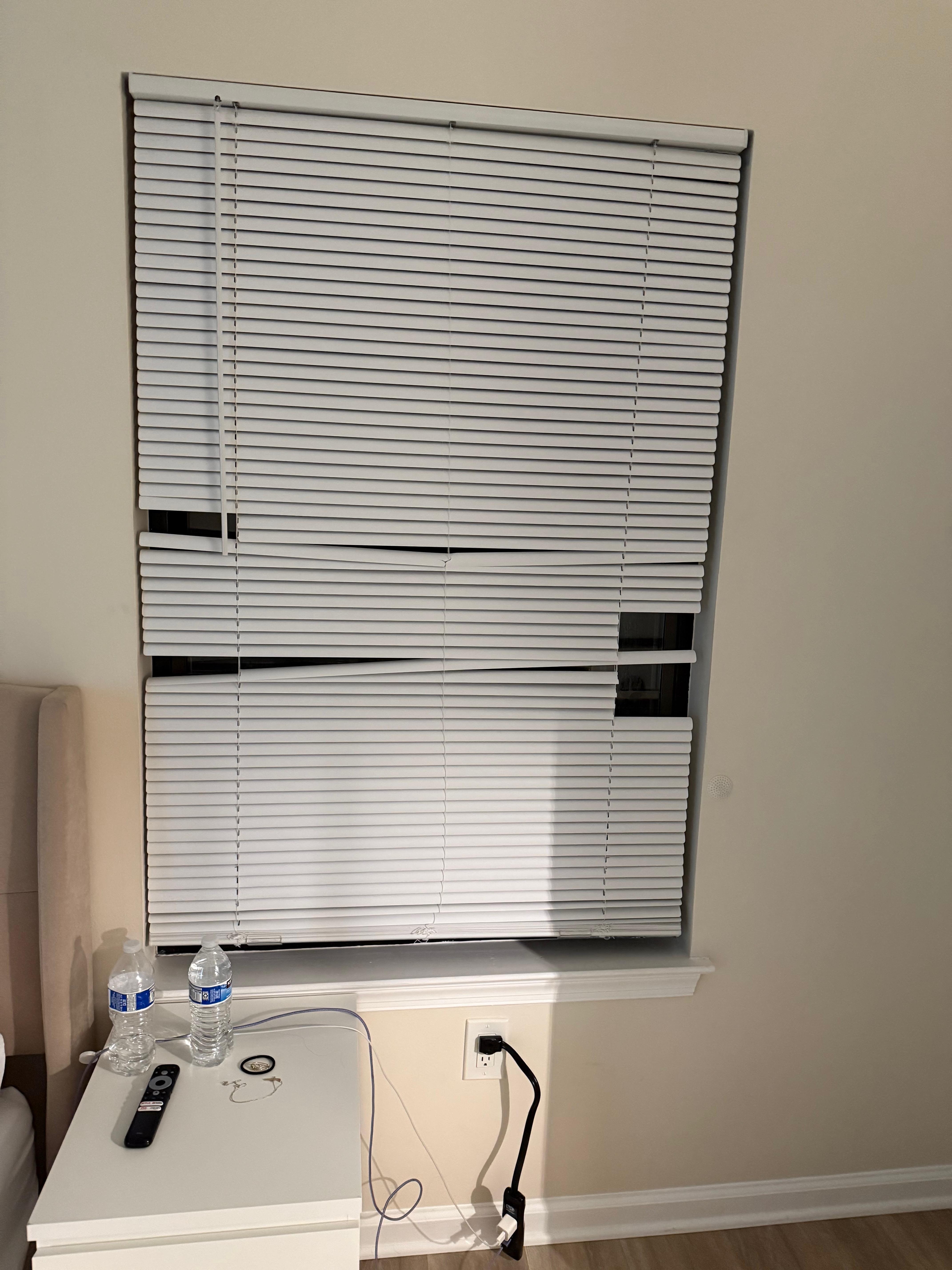 Broken blinds in several rooms.