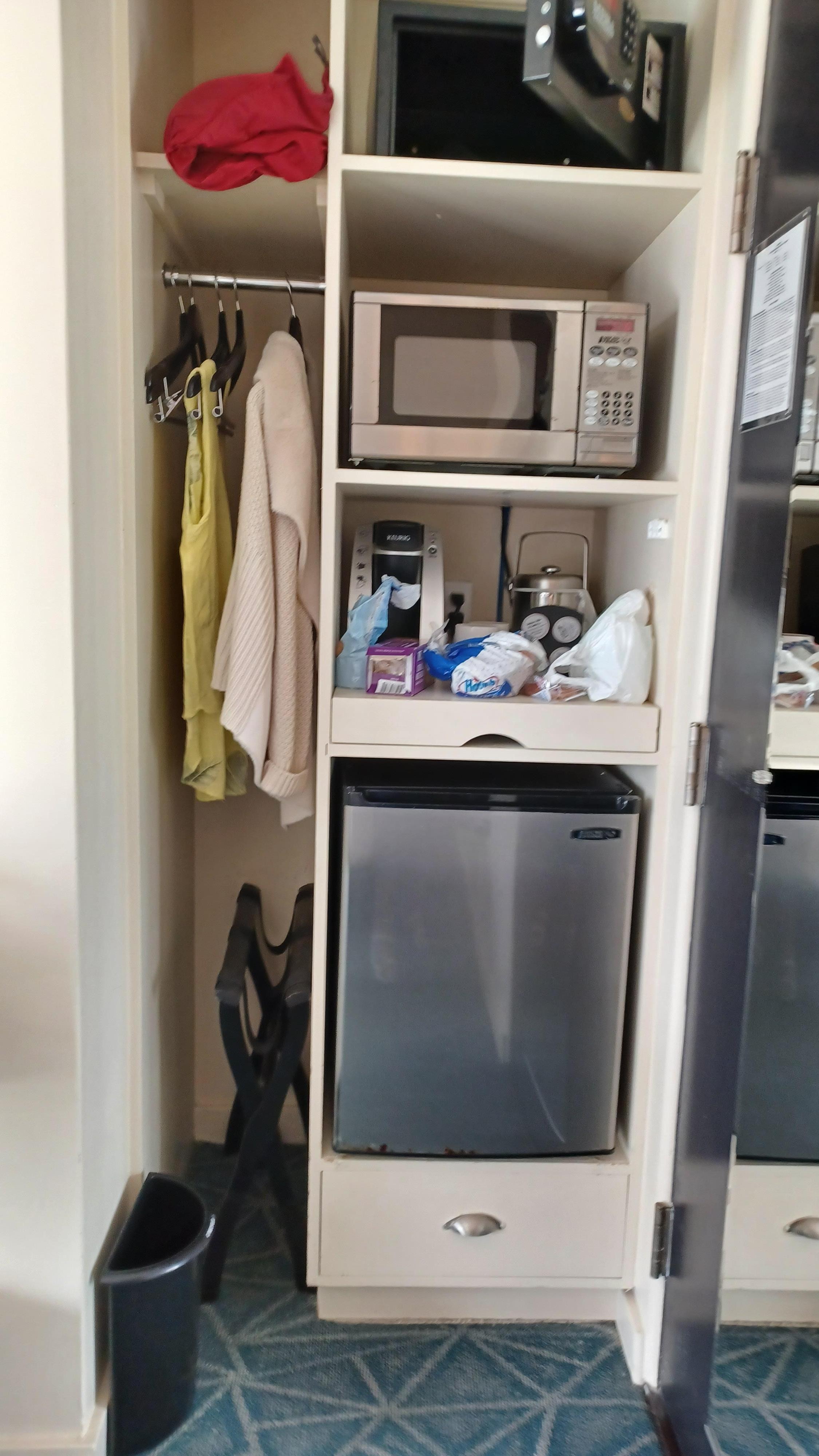 Tiny wardrobe. Very high safe.