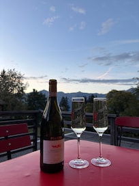 Wine on the deck overlooking gorgeous views.