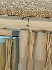 Dirty curtain and ceiling