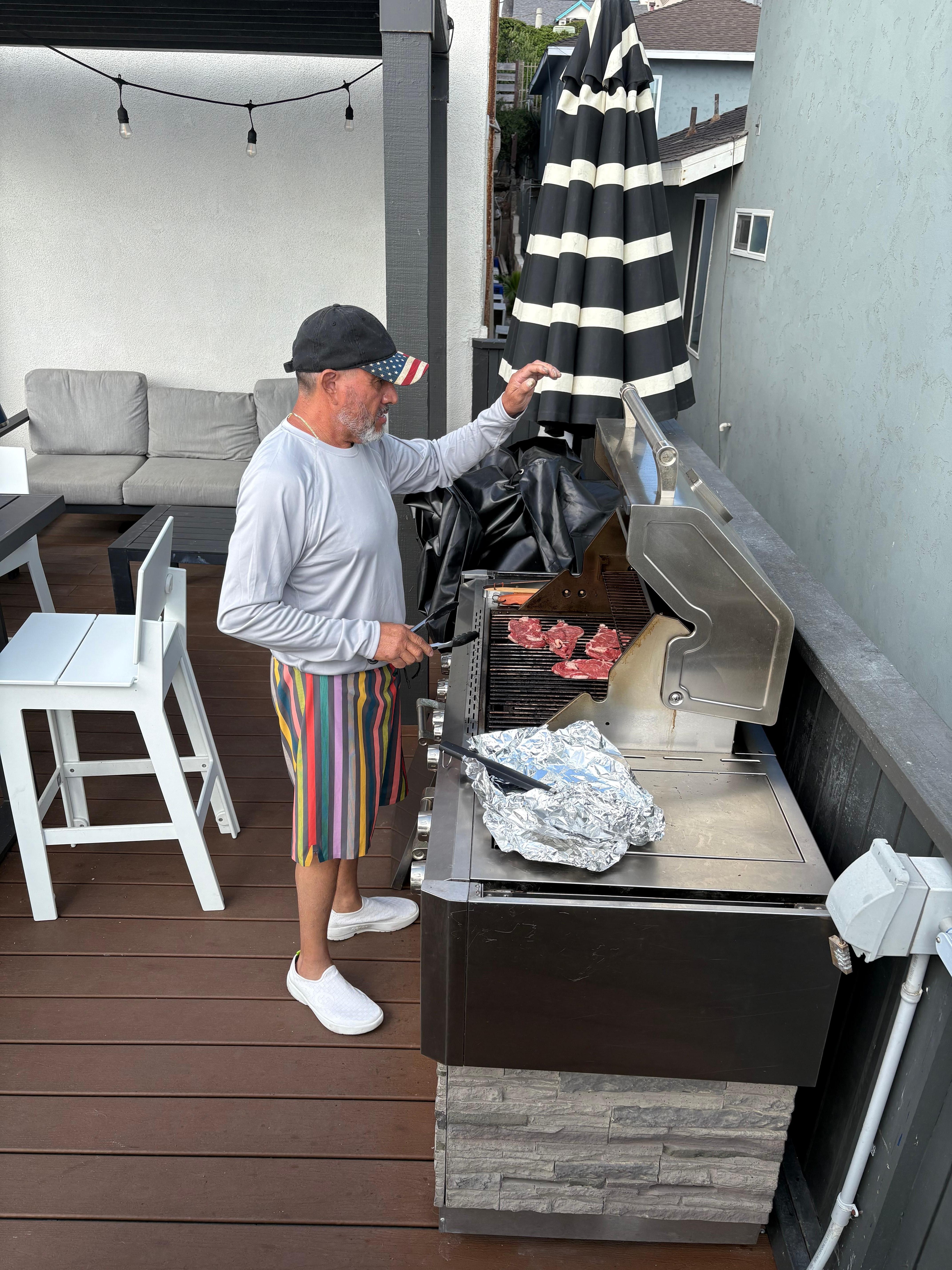 The front patio has a nice barbecue area, lots of sitting space, and a direct view of the ocean and strand. The nighttime fireplace is great too.